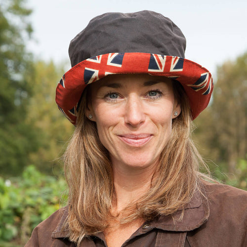 bradleys-tannery-megan-brown-wax-hat-with-union-jack-under-brim-on-woman